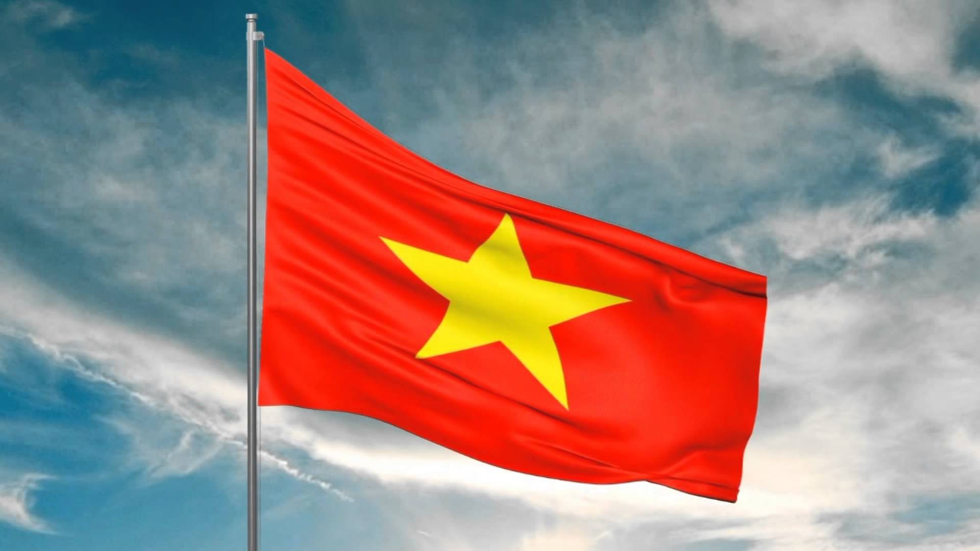 Tả lá cờ Tổ quốc trên bầu trời xanh rực rỡ mang nhiều ý nghĩa lịch sử và tinh thần yêu nước. Đây là biểu tượng của sự đoàn kết và tình yêu quê hương. Hãy xem hình ảnh liên quan để cùng chia sẻ tình yêu đối với đất nước Việt Nam.